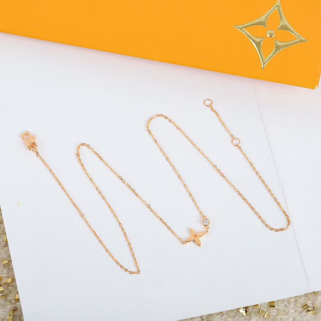 Louis Vuitton Gold-Tone Diamond Cross Necklace Louis Vuitton Gold-Tone Diamond Cross Necklace